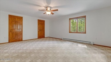 Nestled in the desirable Tanglwood Lakes community, this on Paupack Hills Golf and Country Club in Pennsylvania - for sale on GolfHomes.com, golf home, golf lot