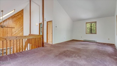 Nestled in the desirable Tanglwood Lakes community, this on Paupack Hills Golf and Country Club in Pennsylvania - for sale on GolfHomes.com, golf home, golf lot