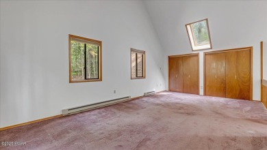 Nestled in the desirable Tanglwood Lakes community, this on Paupack Hills Golf and Country Club in Pennsylvania - for sale on GolfHomes.com, golf home, golf lot