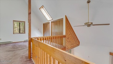 Nestled in the desirable Tanglwood Lakes community, this on Paupack Hills Golf and Country Club in Pennsylvania - for sale on GolfHomes.com, golf home, golf lot
