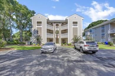 First-Floor End-Unit Condo in River Creek II - Sea Trail on Sea Trail Golf Resort in North Carolina - for sale on GolfHomes.com, golf home, golf lot
