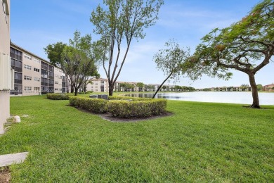 Experience luxury living in this stunning breathtaking lake view on Flamingo Lakes Country Club in Florida - for sale on GolfHomes.com, golf home, golf lot