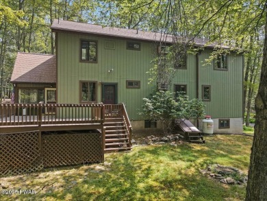Nestled in the desirable Tanglwood Lakes community, this on Paupack Hills Golf and Country Club in Pennsylvania - for sale on GolfHomes.com, golf home, golf lot