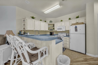 First-Floor End-Unit Condo in River Creek II - Sea Trail on Sea Trail Golf Resort in North Carolina - for sale on GolfHomes.com, golf home, golf lot