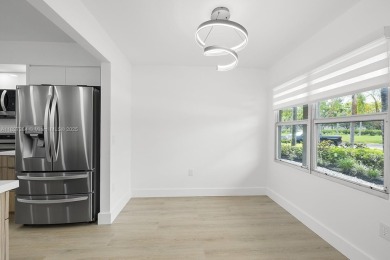 Experience luxury living in this stunning breathtaking lake view on Flamingo Lakes Country Club in Florida - for sale on GolfHomes.com, golf home, golf lot
