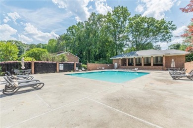 Welcome to this beautifully maintained all-brick townhome that on Dunwoody Country Club in Georgia - for sale on GolfHomes.com, golf home, golf lot