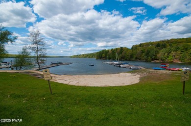 Nestled in the desirable Tanglwood Lakes community, this on Paupack Hills Golf and Country Club in Pennsylvania - for sale on GolfHomes.com, golf home, golf lot