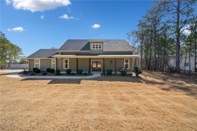 This charming Craftsman-style Home offers 4 spacious Bedrooms on St. Andrews Golf and Country Club in Georgia - for sale on GolfHomes.com, golf home, golf lot