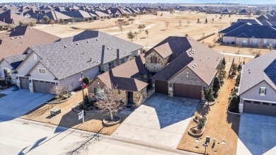 Discover the perfect blend of comfort and style in this stunning on Wildhorse Golf Club of Robson Ranch in Texas - for sale on GolfHomes.com, golf home, golf lot