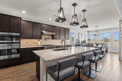 Discover the perfect blend of comfort and style in this stunning on Wildhorse Golf Club of Robson Ranch in Texas - for sale on GolfHomes.com, golf home, golf lot