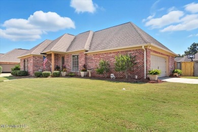 Welcome home to this charming 3-bedroom, 2-bath residence in the on Lake Caroline Golf Club in Mississippi - for sale on GolfHomes.com, golf home, golf lot