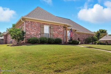 Welcome home to this charming 3-bedroom, 2-bath residence in the on Lake Caroline Golf Club in Mississippi - for sale on GolfHomes.com, golf home, golf lot