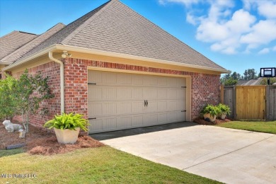 Welcome home to this charming 3-bedroom, 2-bath residence in the on Lake Caroline Golf Club in Mississippi - for sale on GolfHomes.com, golf home, golf lot