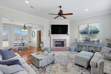 Welcome home to this charming 3-bedroom, 2-bath residence in the on Lake Caroline Golf Club in Mississippi - for sale on GolfHomes.com, golf home, golf lot