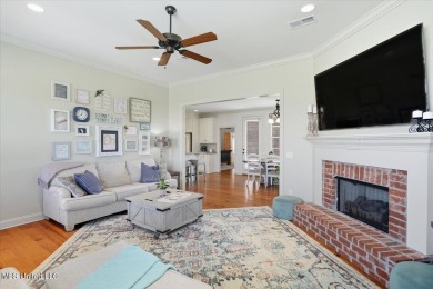 Welcome home to this charming 3-bedroom, 2-bath residence in the on Lake Caroline Golf Club in Mississippi - for sale on GolfHomes.com, golf home, golf lot