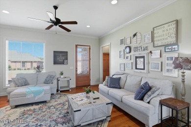 Welcome home to this charming 3-bedroom, 2-bath residence in the on Lake Caroline Golf Club in Mississippi - for sale on GolfHomes.com, golf home, golf lot