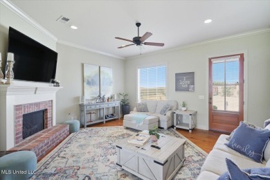 Welcome home to this charming 3-bedroom, 2-bath residence in the on Lake Caroline Golf Club in Mississippi - for sale on GolfHomes.com, golf home, golf lot