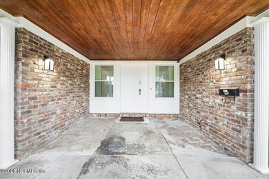 Single Level Living and no HOA in this brick, single family pool on Blue Cypress Golf Club in Florida - for sale on GolfHomes.com, golf home, golf lot