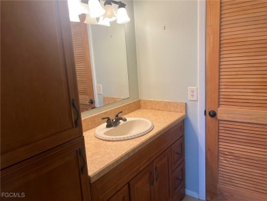 This one bedroom one bathroom has updated kitchen cabinets with on Seven Lakes Golf and Tennis Community in Florida - for sale on GolfHomes.com, golf home, golf lot