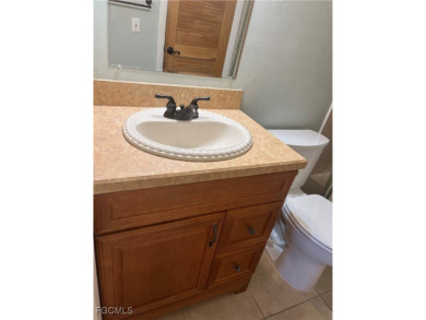 This one bedroom one bathroom has updated kitchen cabinets with on Seven Lakes Golf and Tennis Community in Florida - for sale on GolfHomes.com, golf home, golf lot