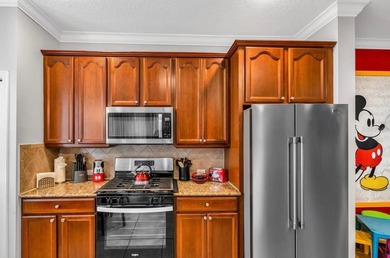 Renovated, fully furnished 2-story townhome in gated Reunion on Reunion Resort Golf Course in Florida - for sale on GolfHomes.com, golf home, golf lot