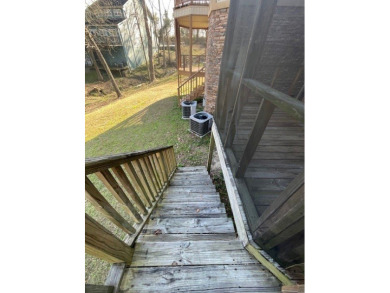 Situated along the waters edge in the prestigious neighborhood on Red Eagle Golf Course in Alabama - for sale on GolfHomes.com, golf home, golf lot