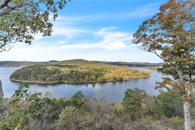 This home boasts a view like few others can perched high on a on Holiday Island Executive Golf Course in Arkansas - for sale on GolfHomes.com, golf home, golf lot