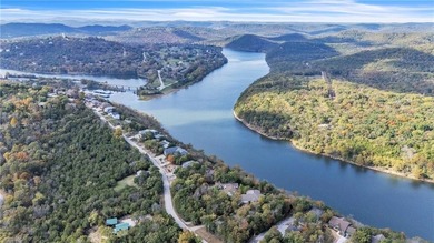 This home boasts a view like few others can perched high on a on Holiday Island Executive Golf Course in Arkansas - for sale on GolfHomes.com, golf home, golf lot