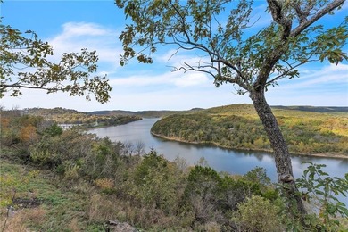 This home boasts a view like few others can perched high on a on Holiday Island Executive Golf Course in Arkansas - for sale on GolfHomes.com, golf home, golf lot