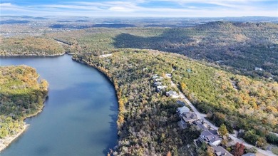 This home boasts a view like few others can perched high on a on Holiday Island Executive Golf Course in Arkansas - for sale on GolfHomes.com, golf home, golf lot