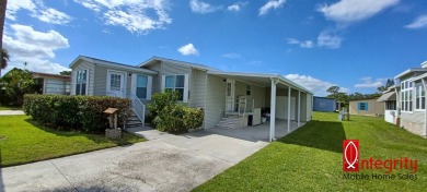 Come settle down and relax in a beautiful manufactured home with on Fairways Country Club in Florida - for sale on GolfHomes.com, golf home, golf lot