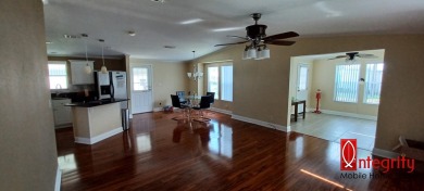 Come settle down and relax in a beautiful manufactured home with on Fairways Country Club in Florida - for sale on GolfHomes.com, golf home, golf lot