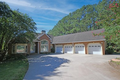 Spectacular Lakefront Retreat Priced to Sell! Discover endless for sale on GolfHomes.com