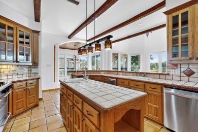 Welcome to this stunning Mediterranean-inspired retreat located on Hackberry Creek Country Club in Texas - for sale on GolfHomes.com, golf home, golf lot
