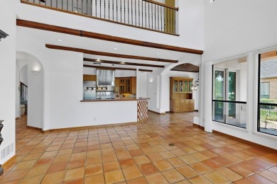 Welcome to this stunning Mediterranean-inspired retreat located on Hackberry Creek Country Club in Texas - for sale on GolfHomes.com, golf home, golf lot