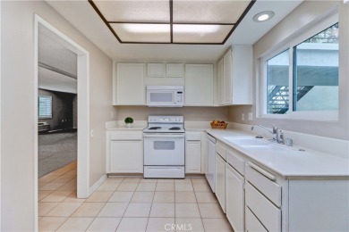 Welcome to this charming  2-bedroom, 2-bathroom condominium on Leisure Village Par 3 Golf Course in California - for sale on GolfHomes.com, golf home, golf lot