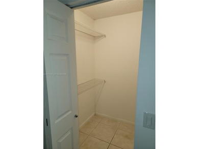 An inviting and well maintained condo in Century Village's 55+ on Flamingo Lakes Country Club in Florida - for sale on GolfHomes.com, golf home, golf lot