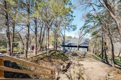 Nestled in a peaceful, wooded setting, this charming 3-bedroom on Tanglewood Resort in Texas - for sale on GolfHomes.com, golf home, golf lot