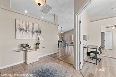 This gorgeous townhome sits right off the golf course and has on The Oasis Golf Club in Nevada - for sale on GolfHomes.com, golf home, golf lot