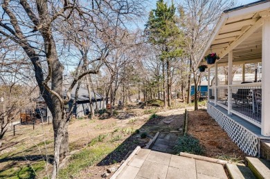 Nestled in a peaceful, wooded setting, this charming 3-bedroom on Tanglewood Resort in Texas - for sale on GolfHomes.com, golf home, golf lot