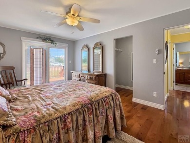 Beautifully maintained and move-in ready, this 4 BED, 4 BATH on Hollydot Golf Course in Colorado - for sale on GolfHomes.com, golf home, golf lot