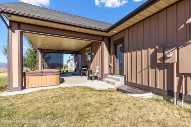 This exceptional 5-bedroom, 3-bath home, built by the renowned on Star Valley RV Golf Course in Wyoming - for sale on GolfHomes.com, golf home, golf lot