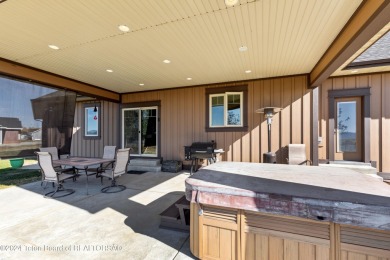 This exceptional 5-bedroom, 3-bath home, built by the renowned on Star Valley RV Golf Course in Wyoming - for sale on GolfHomes.com, golf home, golf lot