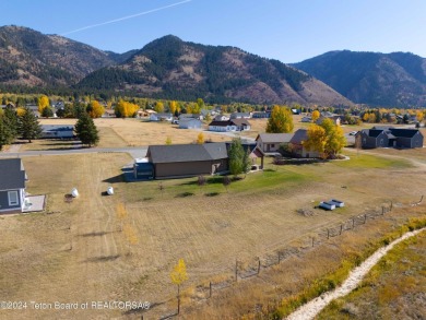 This exceptional 5-bedroom, 3-bath home, built by the renowned on Star Valley RV Golf Course in Wyoming - for sale on GolfHomes.com, golf home, golf lot