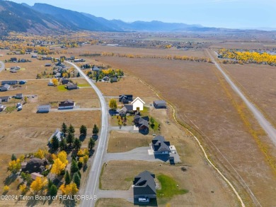 This exceptional 5-bedroom, 3-bath home, built by the renowned on Star Valley RV Golf Course in Wyoming - for sale on GolfHomes.com, golf home, golf lot