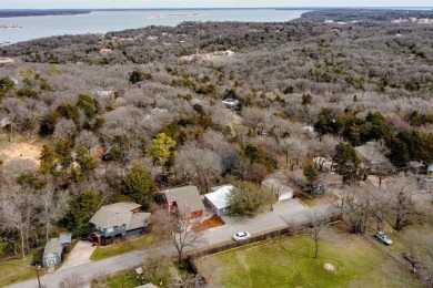 Nestled in a peaceful, wooded setting, this charming 3-bedroom on Tanglewood Resort in Texas - for sale on GolfHomes.com, golf home, golf lot