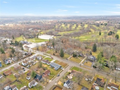 Step into a world of charm with this stunning 1929 all brick on Alliance Country Club in Ohio - for sale on GolfHomes.com, golf home, golf lot