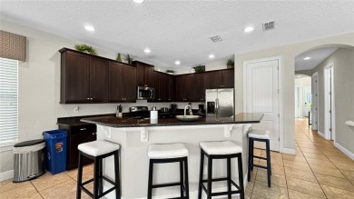 Stunning 6-Bedroom, 5.5-Bath Pool Home Perfectly Situated On The on Reunion Resort Golf Course in Florida - for sale on GolfHomes.com, golf home, golf lot