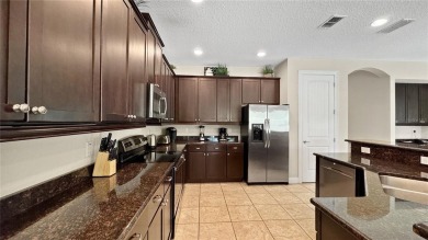 Stunning 6-Bedroom, 5.5-Bath Pool Home Perfectly Situated On The on Reunion Resort Golf Course in Florida - for sale on GolfHomes.com, golf home, golf lot
