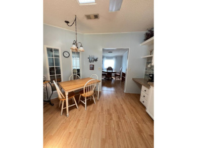 MOTIVATED SELLER! Tucked away in a peaceful Winter Haven 55+ on Lake Henry Golf Club in Florida - for sale on GolfHomes.com, golf home, golf lot